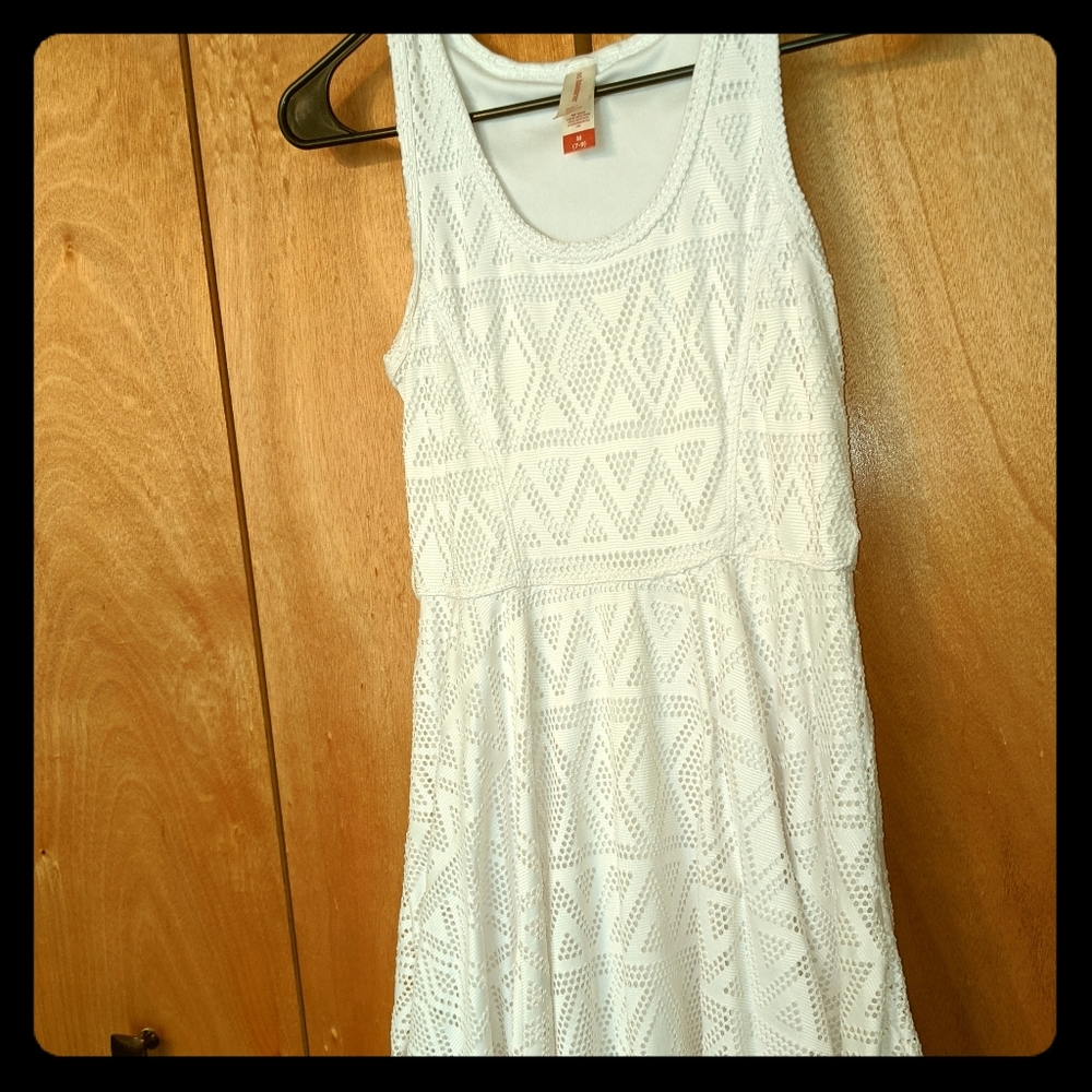 White fitting dress with flare